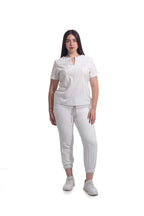 Traje de scrubs Shelsea de Ripplex.mx, con diseño cómodo y profesional, en colores neutros.